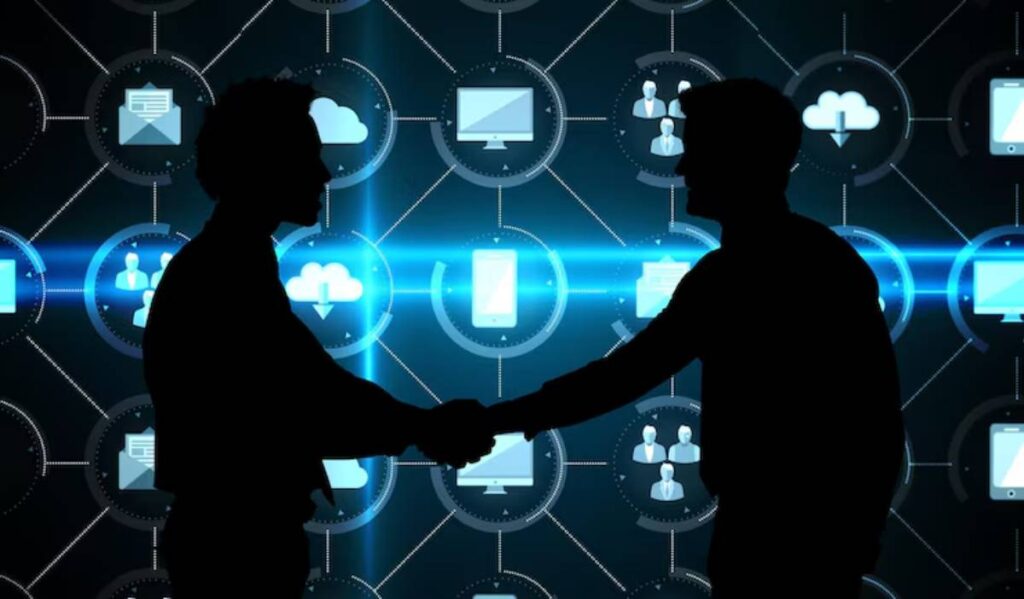 Two silhouetted figures shake hands against a digital background featuring icons representing technology and connectivity.
