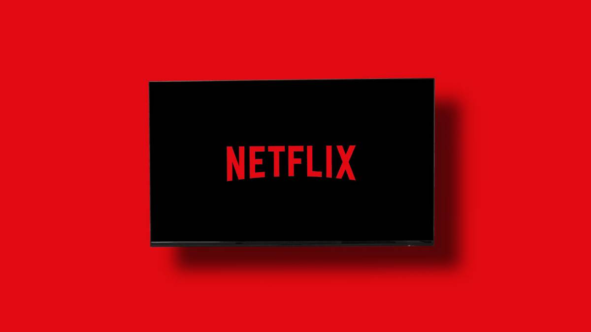 A black television screen displaying the red Netflix logo against a vibrant red background.