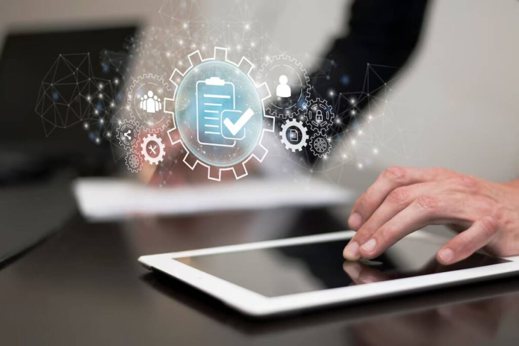 A person interacts with a tablet, surrounded by digital icons representing productivity, checklists, and collaboration.