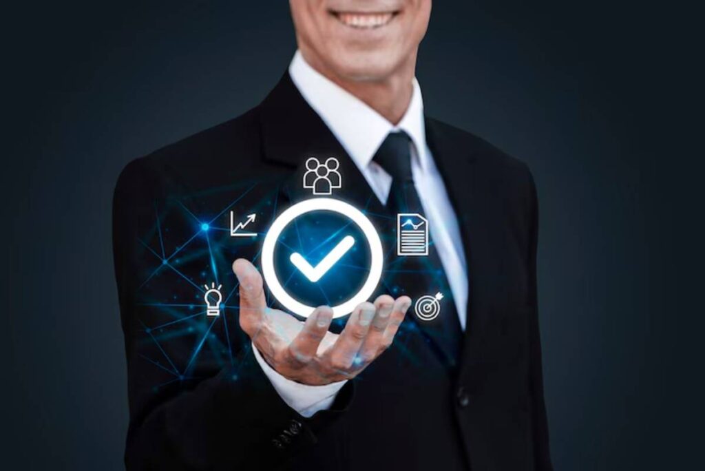 A smiling businessman in a suit holds a glowing checkmark, surrounded by icons representing teamwork, growth, ideas, and documents.